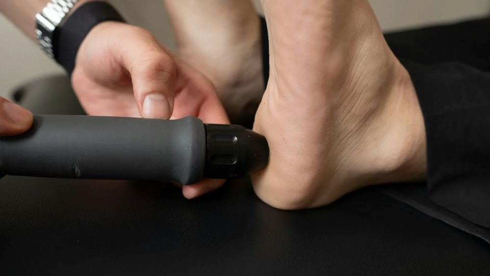 Hands administering foot and ankle therapy